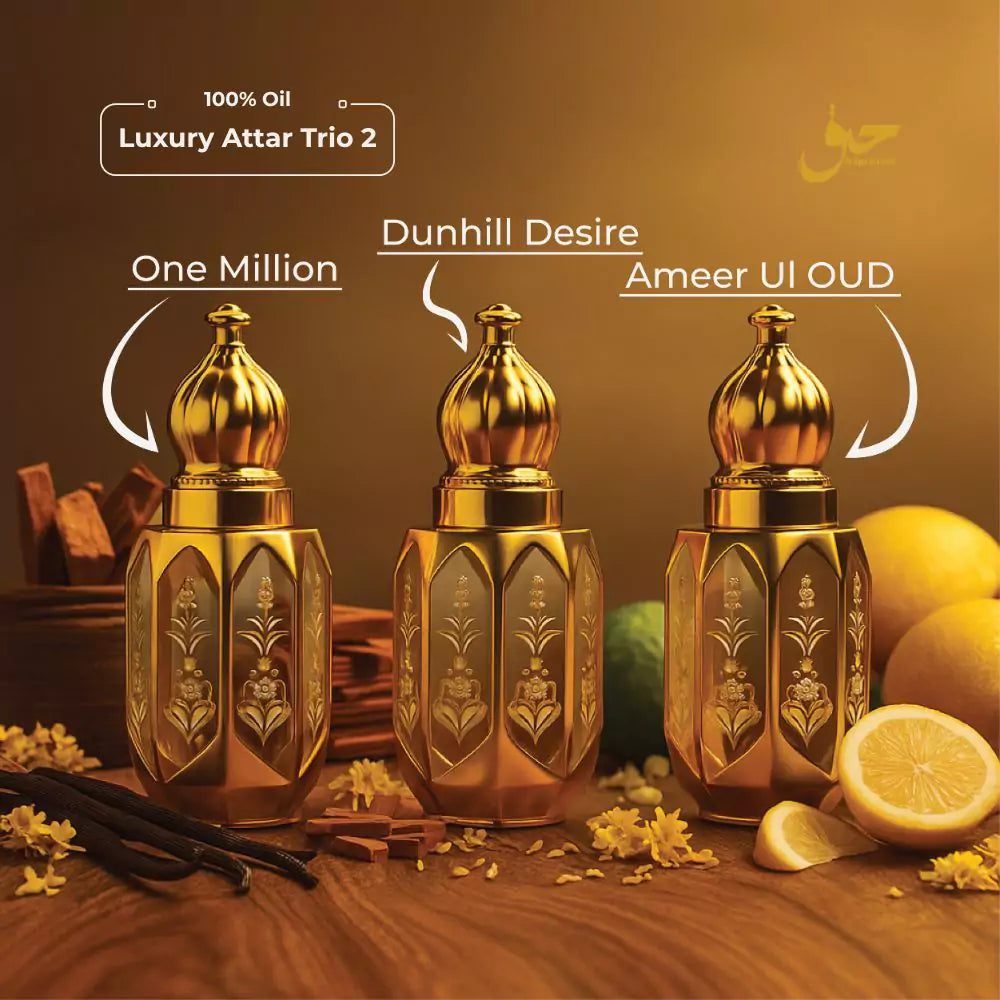 Three gold attar bottles with labels 'One Million', 'Dunhill Desire', and 'Ameer UI OUD' on a wooden surface with fruits and flowers. Haq Fragrances