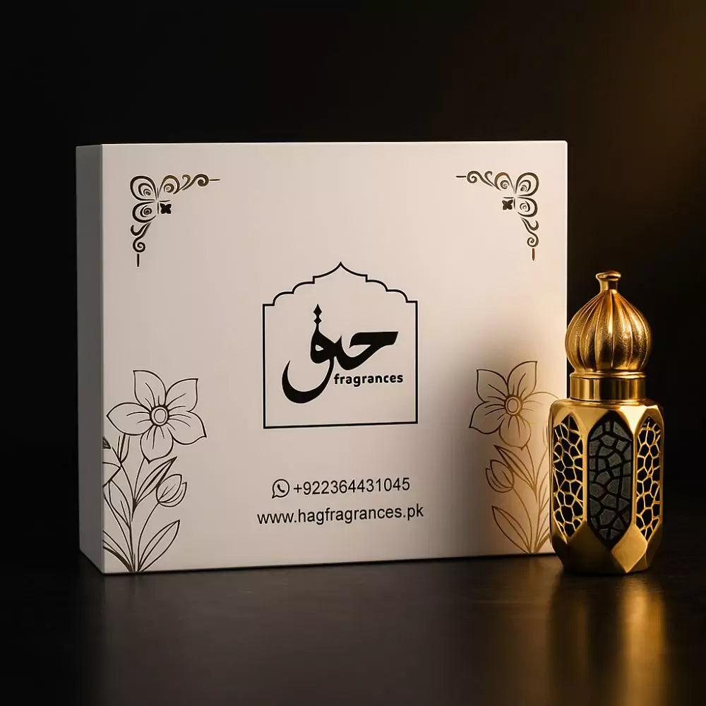 Gold perfume bottle with intricate designs next to a white box featuring 'Hag Fragrances' branding.